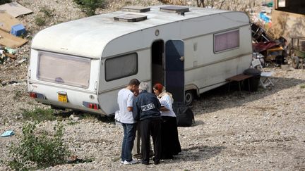 Lors d'une pr&eacute;c&eacute;dente expulsion de Roms d'un terrain &agrave; Saint-Priest, en banlieue de Lyon (Rh&ocirc;ne), en ao&ucirc;t 2006. (JOEL PHILIPPON / LE PROGRES / MAXPPP)