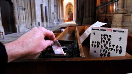 Photo d'illustration d'un&nbsp;tronc dans une église. (MAXPPP)