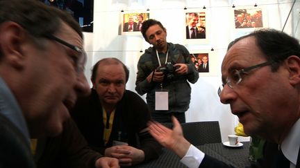 François Hollande et les représentants de "la conf'" cet après-midi au salon de l'agriculture. (HP)