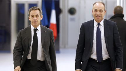 L'ancien pr&eacute;sident de la R&eacute;publique, Nicolas Sarkozy, et l'ancien pr&eacute;sident de l'UMP, Jean-Fran&ccedil;ois Cop&eacute;, le 3 d&eacute;cembre 2014 &agrave; Paris. (THOMAS SAMSON / AFP)