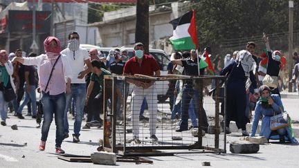 &nbsp; (Israël - Palestine : les heurts entre Palestiniens et armée israélienne sont de plus en plus violents © REUTERS/Mussa Qawasma)