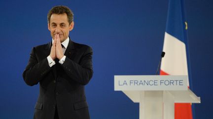 Le pr&eacute;sident candidat Nicolas Sarkozy &agrave; l'issue de son discours de campagne de Villepinte, le 11 mars 2012. (ERIC FEFERBERG / AFP PHOTO)