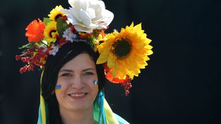 GROUPE D - UKRAINE - Le pays h&ocirc;te est serein. Et &ccedil;a se voit sur ses supporters... (SERGEI SUPINSKY / AFP)