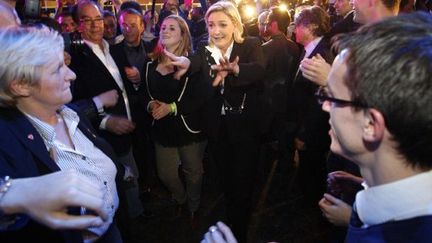 Ambiance de fête au QG électoral de Marine Le Pen, dimanche 22 avril. (FRANCOIS GUILLOT / AFP)