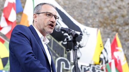 Jean-Guy Talamoni, le président de l'Assemblée corse, à Corte (Haute-Corse), le 6 août 2017. (PASCAL POCHARD-CASABIANCA / AFP)