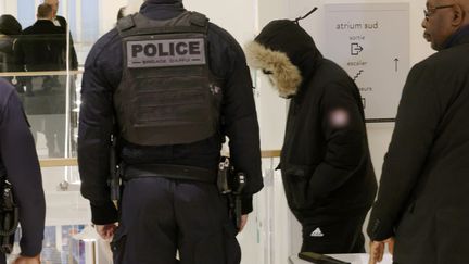 One of the accused arrives at the Paris court for the trial on the role of six teenagers in the death of Samuel Paty, November 27, 2023. (LE PARISIEN / OLIVIER LEJEUNE / MAXPPP)