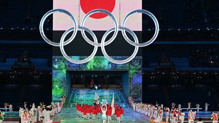 La cérémonie d'ouverture des Jeux olympiques d'été de Tokyo, le 23 juillet 2021. (MANAN VATSYAYANA / AFP)