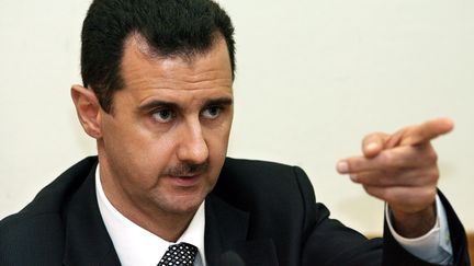 Le pr&eacute;sident syrien Bachar Al-Assad, pendant une conf&eacute;rence de presse en d&eacute;cembre 2006.&nbsp; (YURI KADOBNOV/AFP)