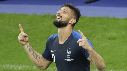 Olivier Giroud célèbre son but lors d'un match contre l'Irlande au Stade de France, à Saint-Denis (Seine-Saint-Denis), le 28 mai 2018. (STEPHANE ALLAMAN / DPPI / AFP)