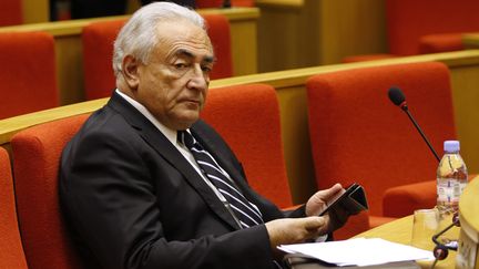 Dominique Strauss-Kahn au S&eacute;nat, le 26 juin 2013 &agrave; Paris. (CHARLES PLATIAU / REUTERS)