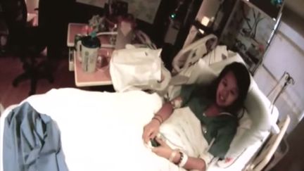 Nina Pham,&nbsp;la premi&egrave;re infirmi&egrave;re contamin&eacute;e par le virus Ebola aux Etats-Unis, appara&icirc;t dans une vid&eacute;o le 16 octobre 2014, film&eacute;e&nbsp;&agrave; l'h&ocirc;pital Texas Health Presbyterian Hospital de Dallas (Etats-Unis). ( YOUTUBE)