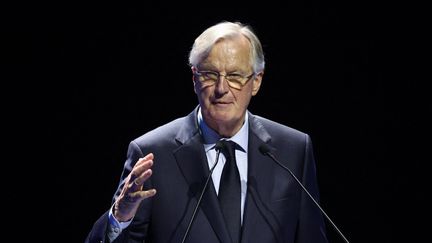 Le Premier ministre Michel Barnier prononce un discours lors du 130e Congrès national des pompiers français, au Parc des Expositions de Mâcon, dans le centre-est de la France, le 28 septembre 2024. (ALEX MARTIN / AFP)