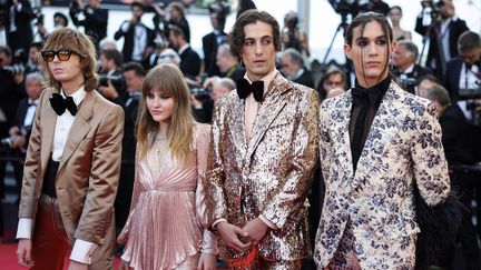 Le groupe italien Maneskin, vainqueur de l'Eurovision 2021 sont aussi sur le tapis rouge. Ils ont composé une chanson pour le film "Elvis".&nbsp; (VALERY HACHE / AFP)