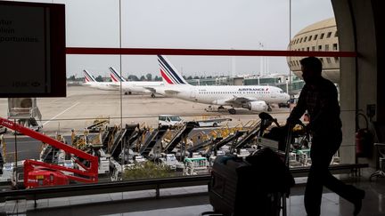 &nbsp; (Dans ses prévisions de trafic, la direction d'Air France annonce en vol sur deux pour demain samedi © MaxPPP)