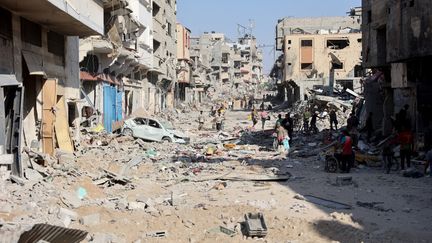 Destroyed buildings in the Shujaiya neighborhood in eastern Gaza City on July 10, 2024. (OMAR AL-QATTAA / AFP)