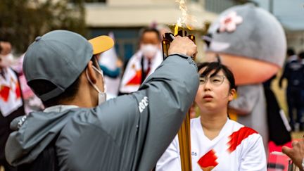 10 ans après la catastrophe, Fukushima a accueilli le départ du relais de la flamme olympique. (PHILIP FONG / AFP)