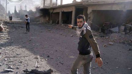 Des rebelles dans la ville de&nbsp;Qousseir (Syrie), le 31 mai 2013. (ANONYMOUS / AP / SIPA)