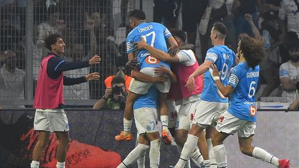 L'Olympique de Marseille se qualifie pour la Ligue des champions après sa victoire face à Strasbourg (4-0) samedi 21 mai. (SYLVAIN THOMAS / AFP)