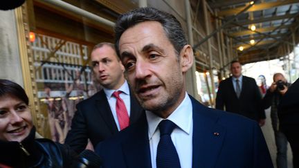 Nicolas Sarkozy lors de son arriv&eacute;e dans l'h&ocirc;tel de New York, o&ugrave; il a donn&eacute; une conf&eacute;rence devant des investisseurs br&eacute;siliens, jeudi 11 octobre. (EMMANUEL DUNAND / AFP)