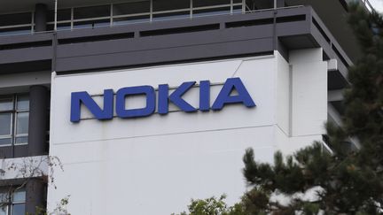 En France, la filiale de Nokia concernée a déjà été visée par deux plans de restructuration ces dernières années. (THOMAS SAMSON / AFP)