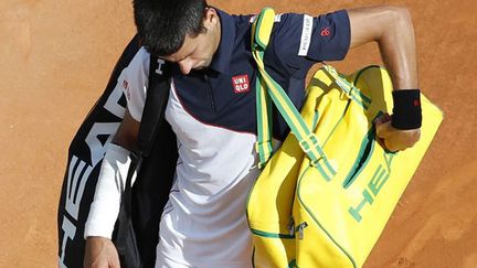 Novak Djokovic avec son bandage à l'avant-bras.