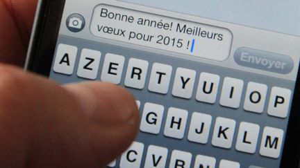 &nbsp; (Les SMS de Nouvel An seraient-ils passés de mode ? © MaxPPP)