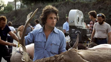 Le réalisateur Michael Cimino sur le tournage du film Voyage au bout de l'enfer, en 1978. (KOBAL)