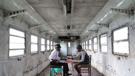 Gosette Lubondo est née à Kinshasa en 1993. Elle pratique la photographie depuis son adolescence grâce à son père, photographe de profession. Sa série «Imaginary Trip» est un travail sur la mémoire des espaces et des individus. L’artiste met en scène des situations dans des espaces abandonnés: une réflexion sur la mémoire des lieux, mais aussi un questionnement sur leur histoire et leur signification dans le contexte d’aujourd’hui.
 (Gosette Lubondo)