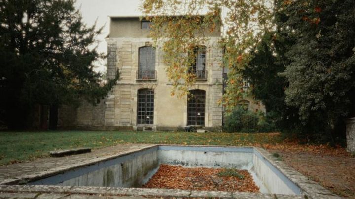 A view of the Château d'Hérouville and its empty swimming pool invaded by dead leaves, in the documentary "Château d’Hérouville, a French rock madness" by Christophe Conte.  (MORGANE PRODUCTIONS)