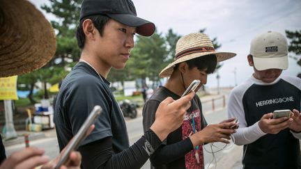  (Pokémon Go est LE jeu à la mode à Sokcho en Corée du Sud, le 15 juillet 2016 © Jean Chung / GettyImages)