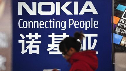 &nbsp; (Les ouvriers de Nokia en Chine se seraient vus offrir des téléphones en échange de leurs démissions.  © REUTERS/Stringer)