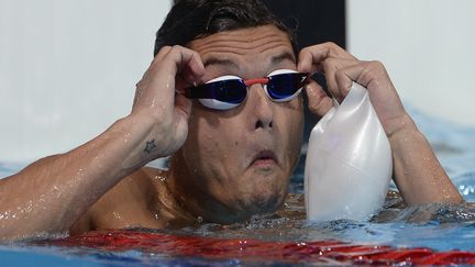 Le nageur fran&ccedil;ais Florent Manaudou, &agrave; l'arriv&eacute;e de sa s&eacute;rie du 50 m nage libre aux Mondiaux de Barcelone (Espagne), le 2 ao&ucirc;t 2013. (LLUIS GENE / AFP)