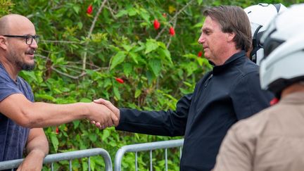 Le président brésilien Jair Bolsonaro, le 28 décembre 2021 à Sao Francisco do Sul (Brésil). (VILMAR BANNACH / PHOTOPRESS / AFP)