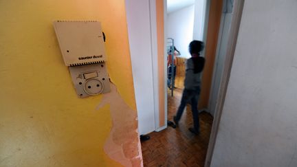 Dans un logement insalubre à Toulouse (Haute-Garonne), en 2012 (ERIC CABANIS / AFP)