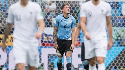 Le désespoir de Jose Gimenez. Le quart de finale contre la France n'est pas encore terminée, mais l'Uruguya est déjà mené 2-0 et le joueur de la Celeste ne peut pas retenir ses larmes, le 6 juillet à Nizhny Novgorod en Russie. (ELMAR KREMSER/SVEN SIMON / SVEN SIMON)