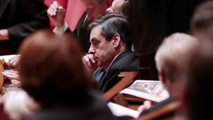 Fran&ccedil;ois Fillon sur les bancs de l'Assembl&eacute;e nationale, &agrave; Paris, le 18 d&eacute;cembre 2012. (JACQUES DEMARTHON / AFP)