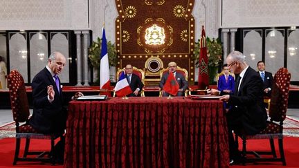  (Laurent Fabius a signé ce texte avec Ahmed Toufik, le ministre marocain des Affaires religieuses © REUTERS)