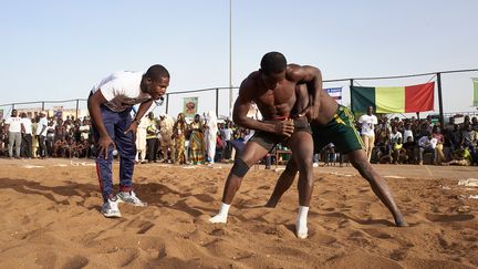 Tournoi de lutte traditionnelle malienne. (MICHELE CATTANI / AFP)