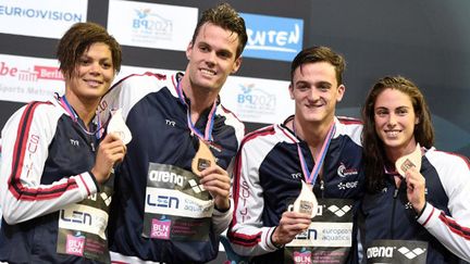 Le relais mixte français avec Coralie Balmy, Clément Mignon, Grégory Mallet et Ana  Santamans  (DAMIEN MEYER / AFP)