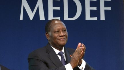 Le pr&eacute;sident ivoirien Alassane Ouattara lors d'une r&eacute;union au Medef, &agrave; Paris, le 27 janvier 2012. &nbsp; (CHARLES PLATIAU / AFP)