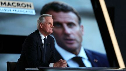 Le Premier ministre, Michel Barnier, sur le plateau de l'émission de France 2 "L'Evénement", le 3 octobre 2024, à Aubervilliers (Seine-Saint-Denis). (THOMAS SAMSON / AFP)