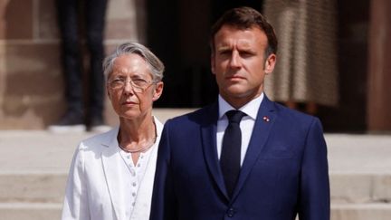 La Première ministre Elisabeth Borne et le président de la République Emmanuel Macron, le 18 juin 2022 à Suresnes (Hauts-de-Seine). (GONZALO FUENTES / AFP)