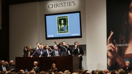 La vente du tableau de Léonard de Vinci "Salvator Mundi" le 15 novembre 2017 chez Christie's.
 (EDUARDO MUNOZ ALVAREZ / GETTY IMAGES NORTH AMERICA / AFP)