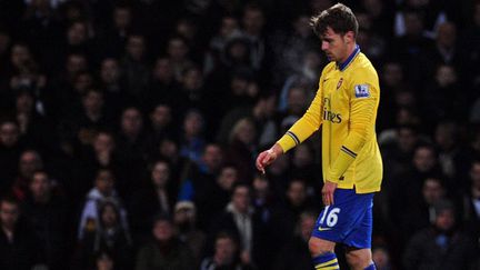 Aaron Ramsey, touché à la cuisse lors du match d'Arsenal face à West Ham (CARL COURT / AFP)