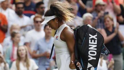 Naomi Osaka après sa défaite au premier tour à Wimbledon contre Yulia Putintseva, le 1er juillet 2019. (ADRIAN DENNIS / AFP)