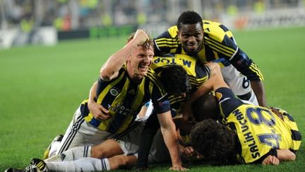 Les joueurs de Fenerbahçe (BULENT KILIC / AFP)