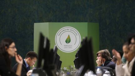 &nbsp; (Les négociations sur les derniers points de désaccord à la COP21 © Reuters/Christian Hartmann)