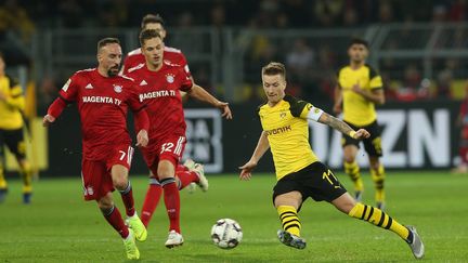 Le joueur du Bayern Munich Franck Ribéry (à gauche), lors du match face au Borussia Dortmund, le 10 novembre 2018. (Verwendung weltweit / AFP)