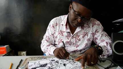 Kash esquisse un portrait de Corneille Nangaa, le président de la Commission électorale nationale indépendante de RDC. (BAZ RATNER / REUTERS)