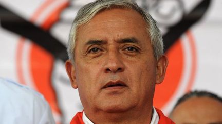 Otto Pérez Molina, le président du Guatemala (ici lors de la campagne électorale de 2011), est soupçonné d'être impliqué dans un vaste scandale de corruption. (Orlando SIERRA / AFP)